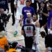 New York Knicks guard Jalen Brunson has words with a San Antonio Spurs fan at the end of the game.