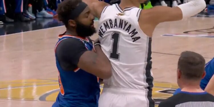 Knicks center Mitchell Robinson (l.) was called for a technical foul on this play with the Spurs' Victor Wembanyama (r.) in the second quarter during Game 2 of the NBA Fianls on June 5, 2026.