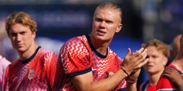 Norway's Erling Haaland applauds at the end of the World Cup Group I soccer match between Norway and France.