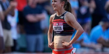 Jenny Simpson smiling after the finals of the women's 1500-meter run at the U.S. Olympic Track and Field Trials.