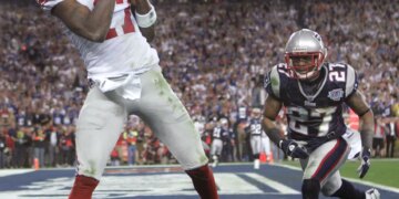 Former Giants receiver Plaxico Burress catches a game-winning pass from Eli Manning in Super Bowl 42.