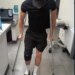 A person with a knee brace and crutches.