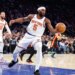 New York Knicks forward Precious Achiuwa rebounds the ball during the first quarter.