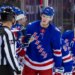 New York Rangers center Adam Edstrom (84) celebrates his goal with the team in the second period against the New Jersey Devils at Madison Square Garden, Thursday, Oct. 2, 2025, in New York, NY.
