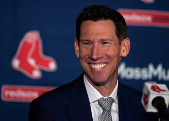 Craig Breslow smiling at his introduction as the Boston Red Sox chief baseball officer.