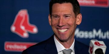 Craig Breslow smiling at his introduction as the Boston Red Sox chief baseball officer.