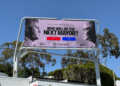 A digital billboard showing Spencer Pratt and Karen Bass with their Polymarket odds for "Who will be the next mayor?".