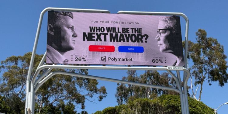 A digital billboard showing Spencer Pratt and Karen Bass with their Polymarket odds for "Who will be the next mayor?".