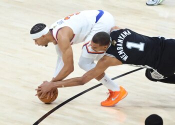 New York Knicks guard Josh Hart steals the ball from San Antonio Spurs forward Victor Wembanyama in the second half of NBA Finals Game 1
