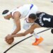 New York Knicks guard Josh Hart steals the ball from San Antonio Spurs forward Victor Wembanyama in the second half of NBA Finals Game 1
