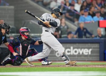 New York Yankees center fielder Trent Grisham hitting an RBI double.