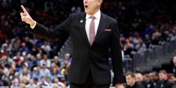 Basketball coach Rick Pitino reacting during the NCAA Sweet Sixteen game.