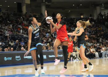 Chicago Sky forward Azura Stevens (30) defends Atlanta Dream forward Angel Reese (5).