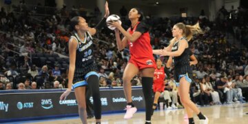 Chicago Sky forward Azura Stevens (30) defends Atlanta Dream forward Angel Reese (5).