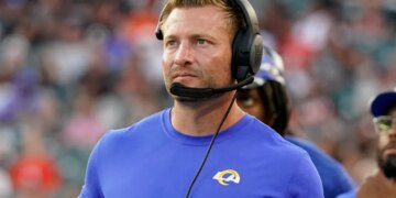 Los Angeles Rams head coach Sean McVay wearing a headset on the sideline.