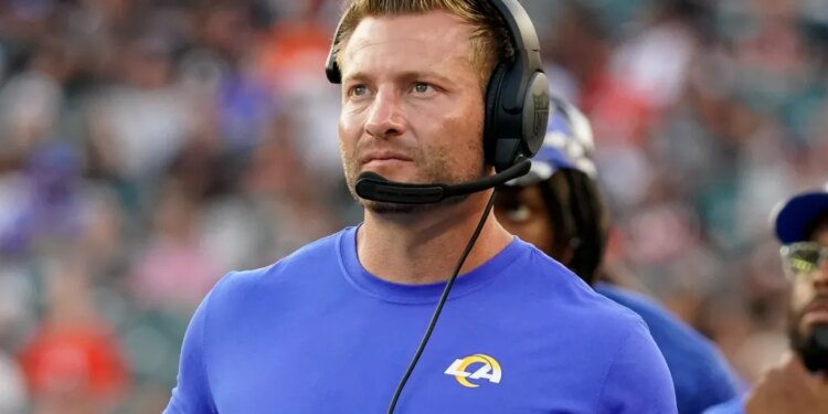 Los Angeles Rams head coach Sean McVay wearing a headset on the sideline.
