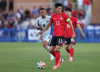 Republic of Korea forward Son Heung-Min (13) looks to pass against El Salvador.