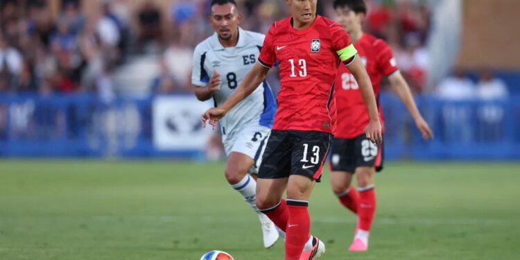 Republic of Korea forward Son Heung-Min (13) looks to pass against El Salvador.