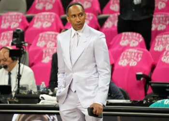 ESPN analyst Stephen A. Smith wearing a white suit before Game 1 of the NBA Finals.