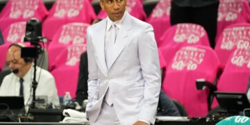 ESPN analyst Stephen A. Smith wearing a white suit before Game 1 of the NBA Finals.