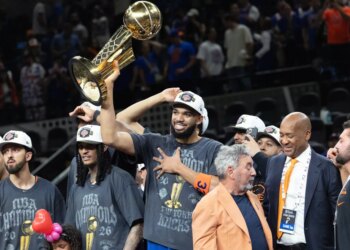 Karl-Anthony Towns celebrates the Knicks winning the NBA championship.