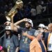 Karl-Anthony Towns celebrates the Knicks winning the NBA championship.