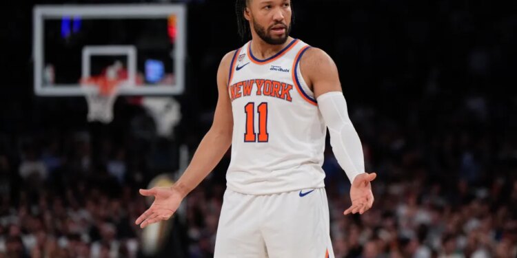 Jalen Brunson in a New York Knicks uniform on the court.