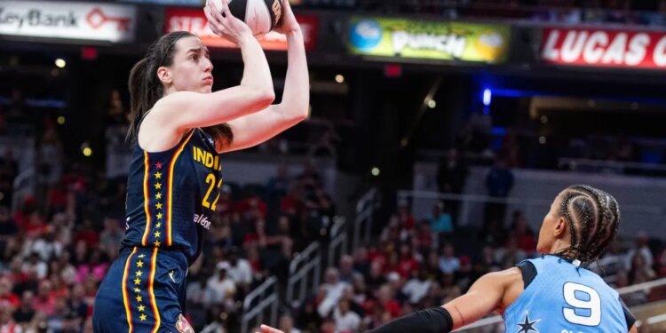 Caitlin Clark, who had 32 points and 10 assists, shoots a jumper over Natasha Cloud during the Fever's 114-106 win over the Sky on June 11, 2026 in Indianapolis.