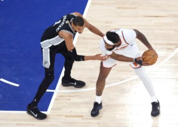 San Antonio Spurs forward Victor Wembanyama (1) defends against New York Knicks center Mitchell Robinson (23) during the first quarter of Game 4.