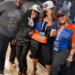 (L-R) Karl-Anthony Towns Sr., Teyana Taylor Jordyn Woods and Elizabeth Woods after the Knicks won the 2026 NBA Finals against the Spurs.