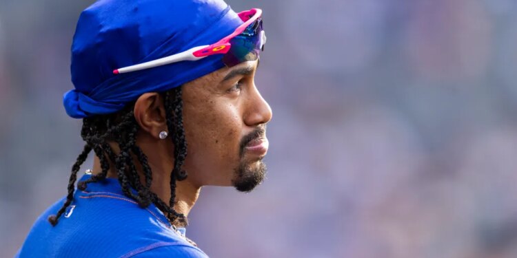 New York Mets player Francisco Lindor reacts in the dugout.