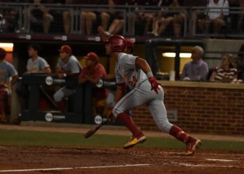 USC's Augie Lopez after a hit.