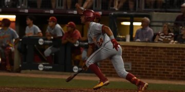 USC's Augie Lopez after a hit.