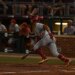 USC's Augie Lopez after a hit.