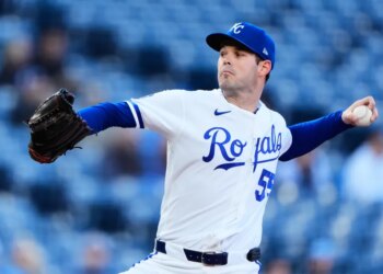 Kansas City Royals starting pitcher Cole Ragans throws during the first inning of a baseball game against the Cleveland Guardians.
