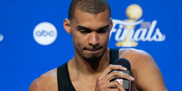 Victor Wembanyama speaks to the media at the NBA Finals.