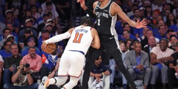 San Antonio Spurs forward Victor Wembanyama #1 defends against New York Knicks guard Jalen Brunson #11 during the second quarter.