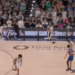 Basketball players on the court during a game.