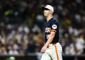 Baseball player Joe Musgrove in a Padres jersey on the field.