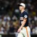 Baseball player Joe Musgrove in a Padres jersey on the field.