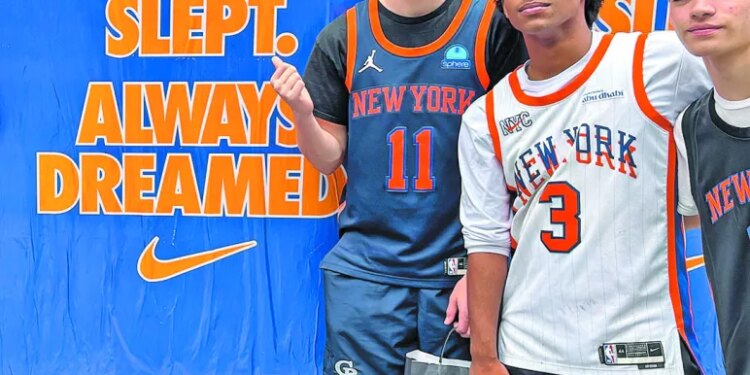 Matt Grande (11), of the Nassau title-winning South Side Cyclones, attended the Knicks ticker-tape parade with friends.