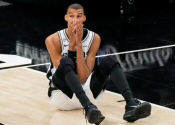 Victor Wembanyama reacts dejectly after a play during the Spurs' 94-90 NBA season-ending Game 5 loss to the Knicks on June 13, 2026 in San Antonio.