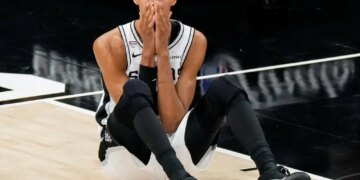 Victor Wembanyama reacts dejectly after a play during the Spurs' 94-90 NBA season-ending Game 5 loss to the Knicks on June 13, 2026 in San Antonio.