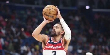 Washington Wizards guard Trae Young (3) attempts a technical foul free throw.