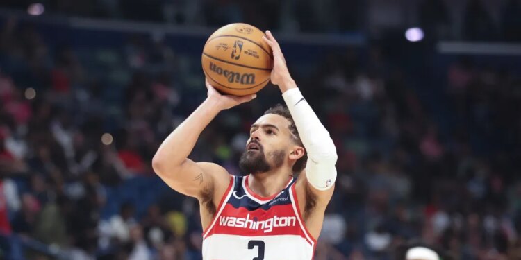 Washington Wizards guard Trae Young (3) attempts a technical foul free throw.