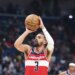 Washington Wizards guard Trae Young (3) attempts a technical foul free throw.
