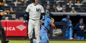 New York Yankees catcher Austin Wells (28) reacts after striking out looking against the Toronto Bluejays.