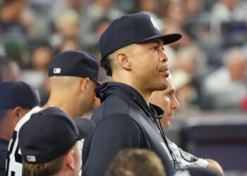Giancarlo Stanton in the New York Yankees dugout.