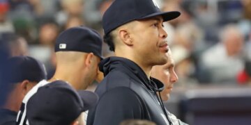 Giancarlo Stanton in the New York Yankees dugout.