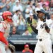 New York Yankees second baseman Jazz Chisholm Jr. #13 reacts as he scores on his solo home run during the second inning.